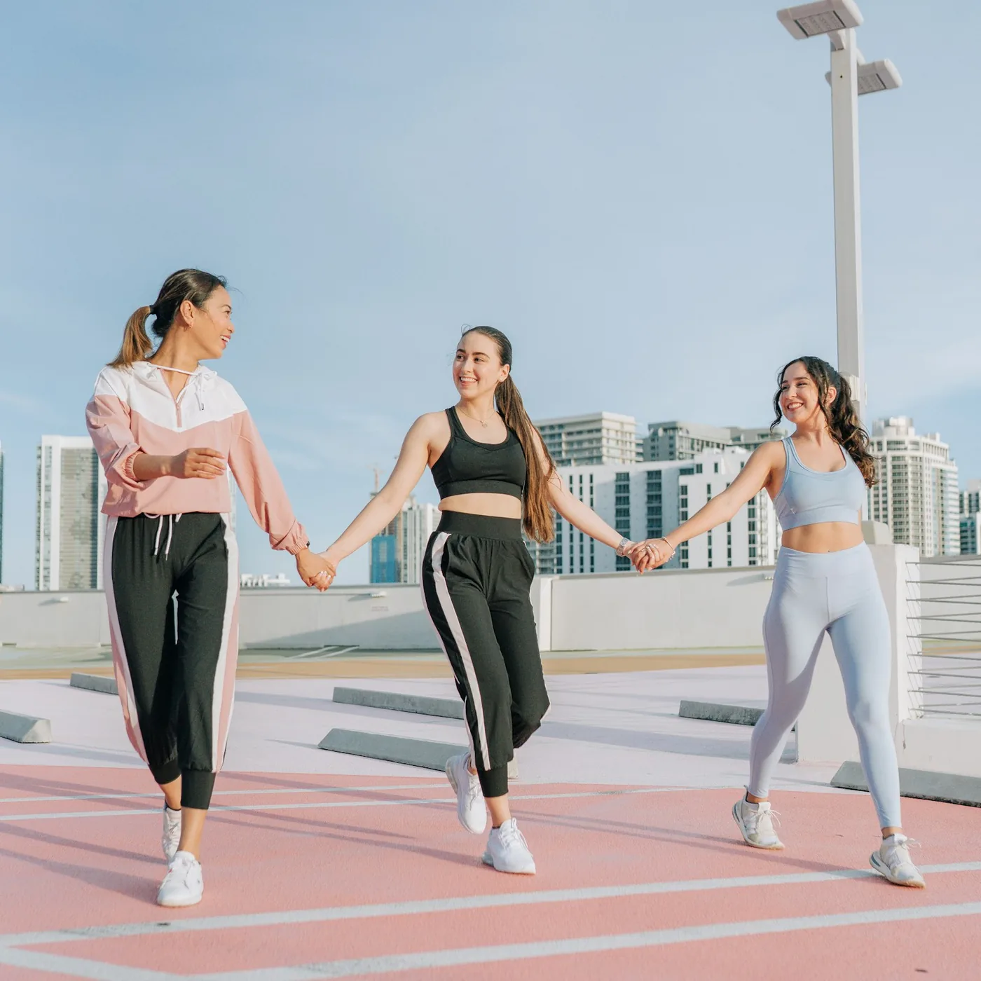 Women in Pave activewear walking together